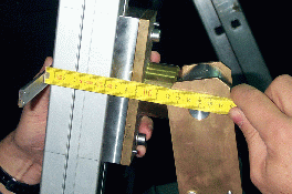 Distance between axis and face of alignment compass