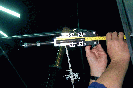 Measureing the length of the screw of the alignment compass
