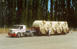 29 - Truck loaded with 8 new tanks arriving