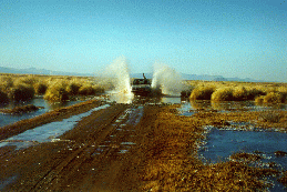 10 - Scott removing water from the road