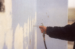 1.21 - Installing rail support: cleaning hole with air